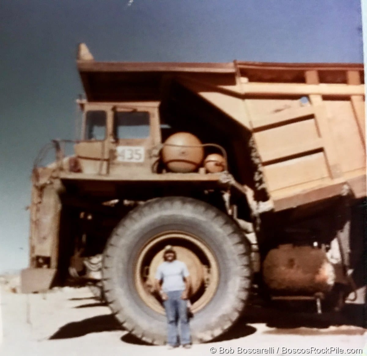 Bosco at the Ruth copper mine haul truck, Nevada